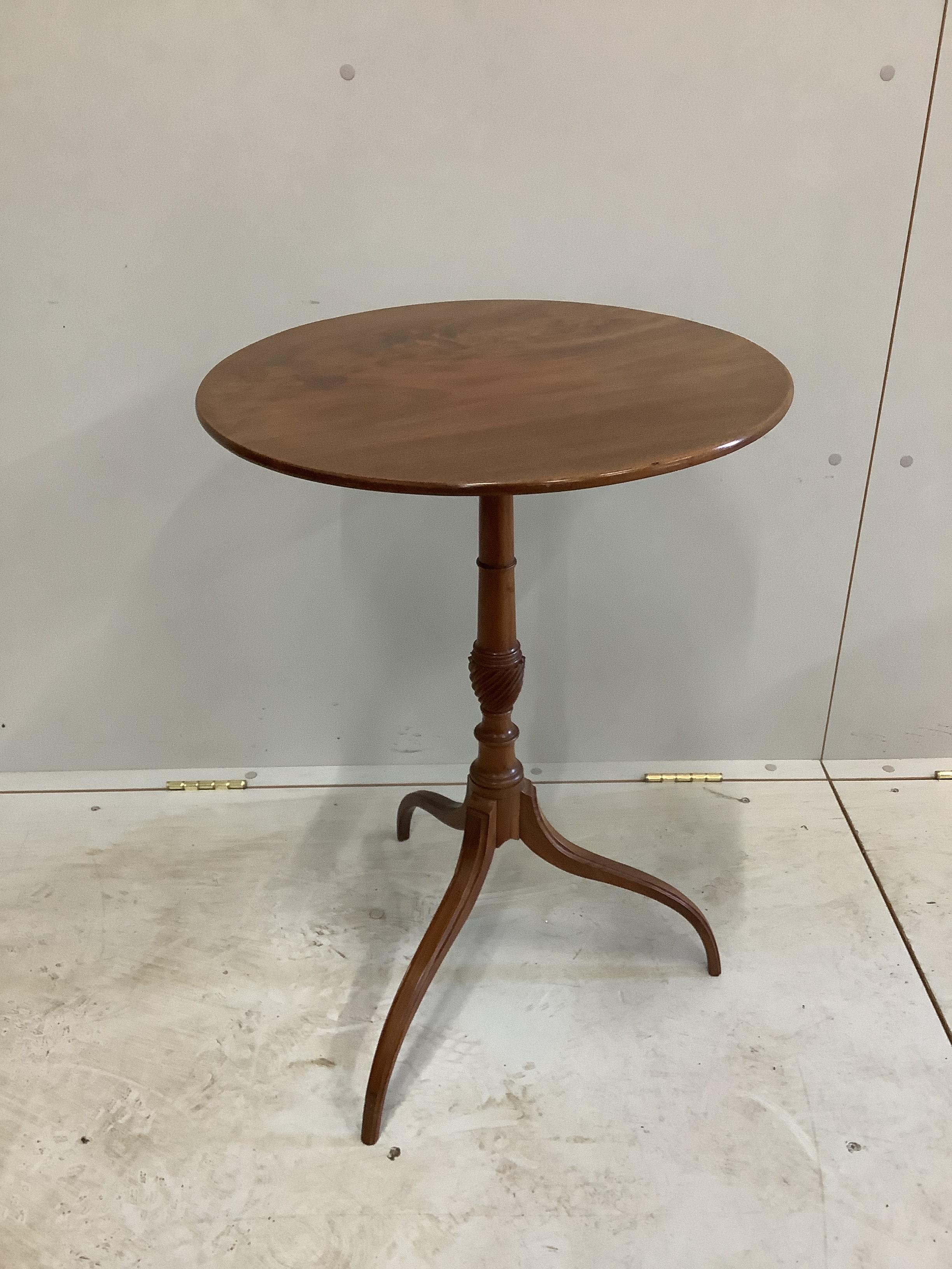 An Edwardian Sheraton style mahogany circular top tripod wine table, diameter 50cm, height 69cm